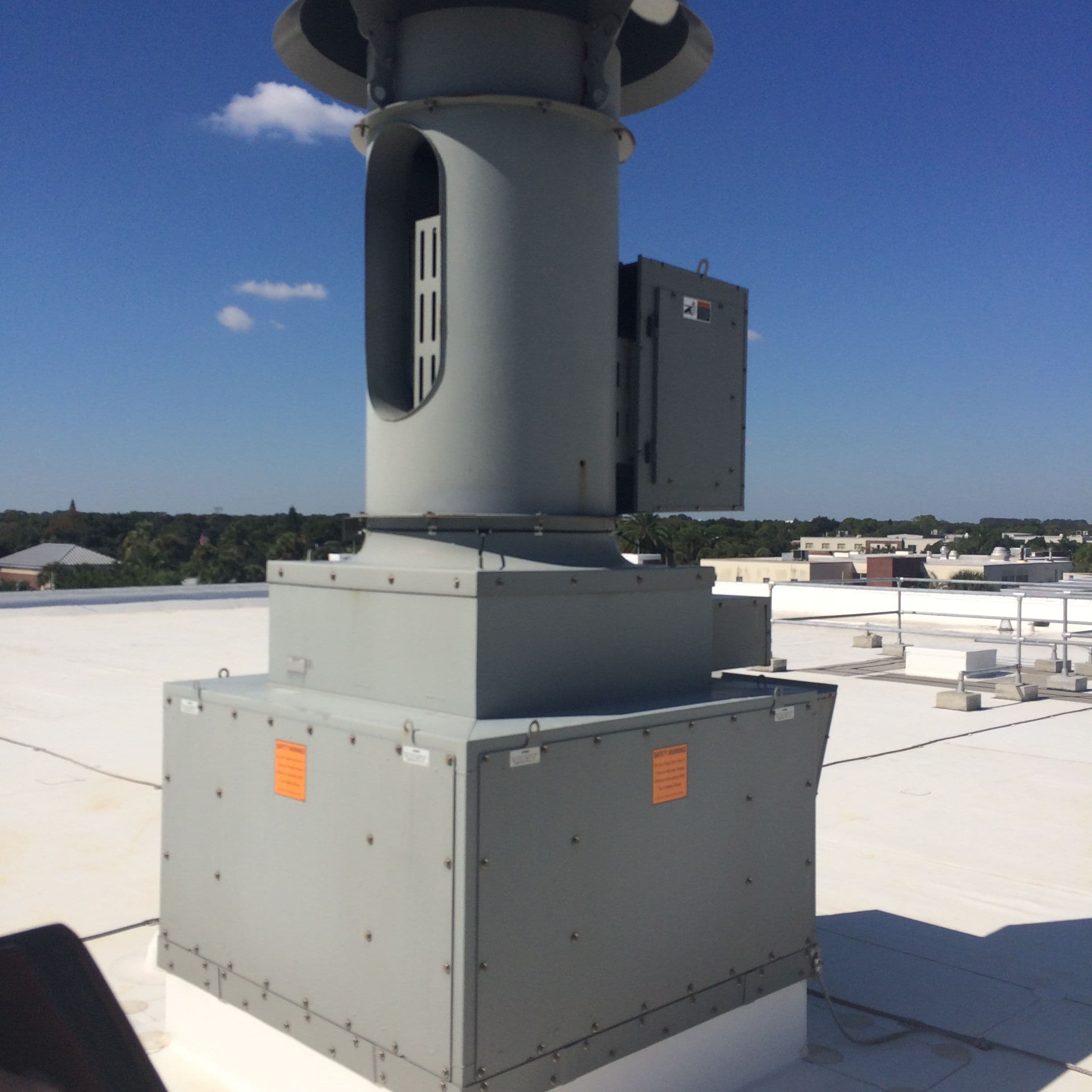 High-plume laboratory exhaust fan on the roof of the Olin Physical Science Building at Florida Institute of Technology in Melbourne, Florida.
